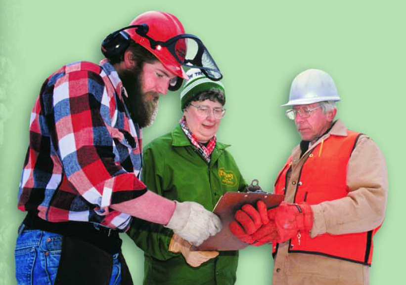 Forest owners talking to a logger